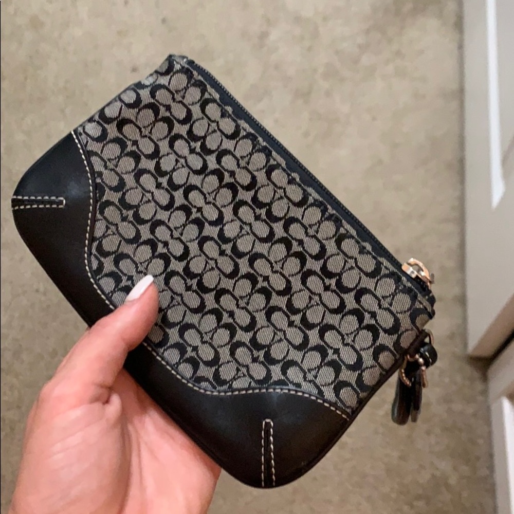 Small black Coach wristlet